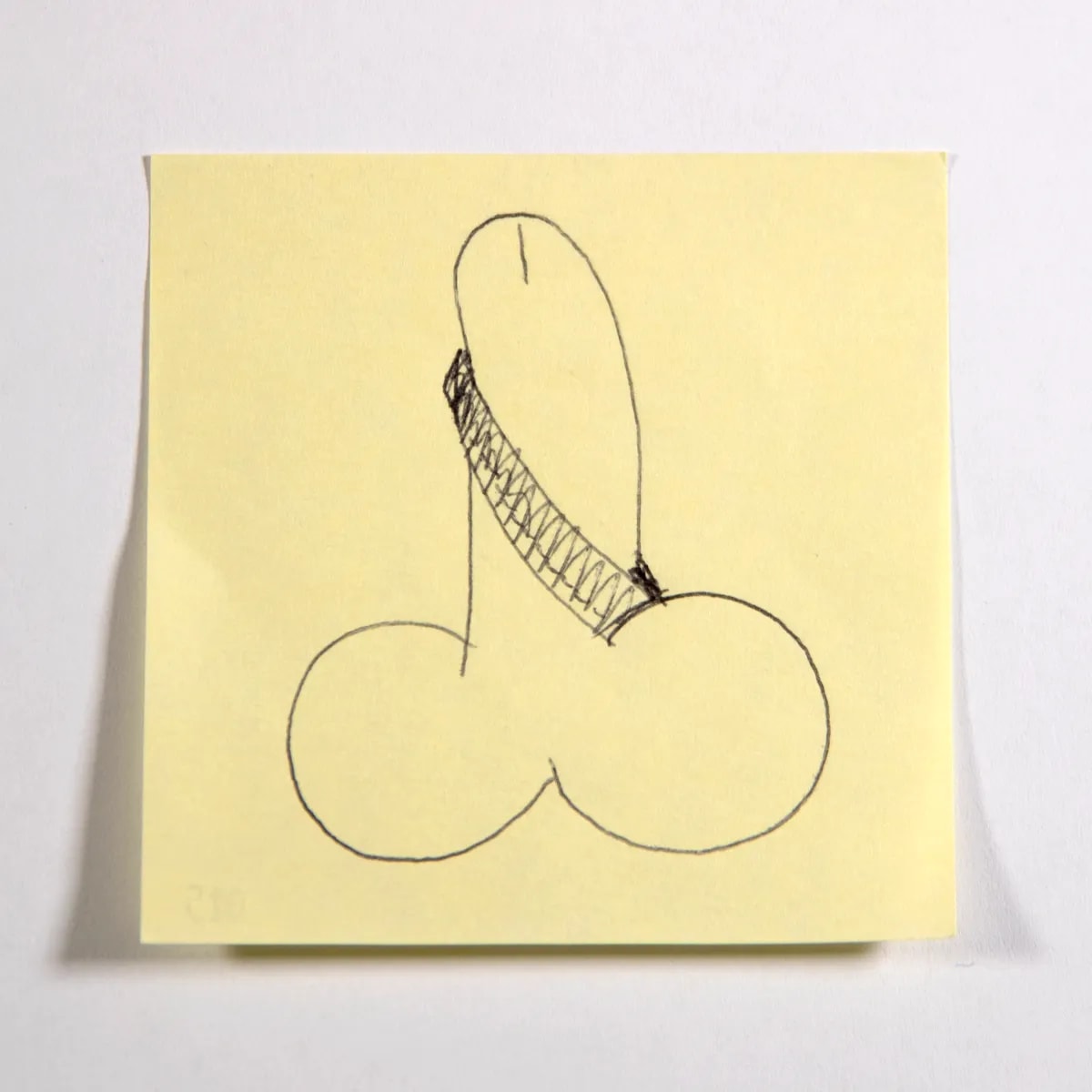 Guerrilla, No. 025 of 512: a hand-drawn cazzo on a sticky note