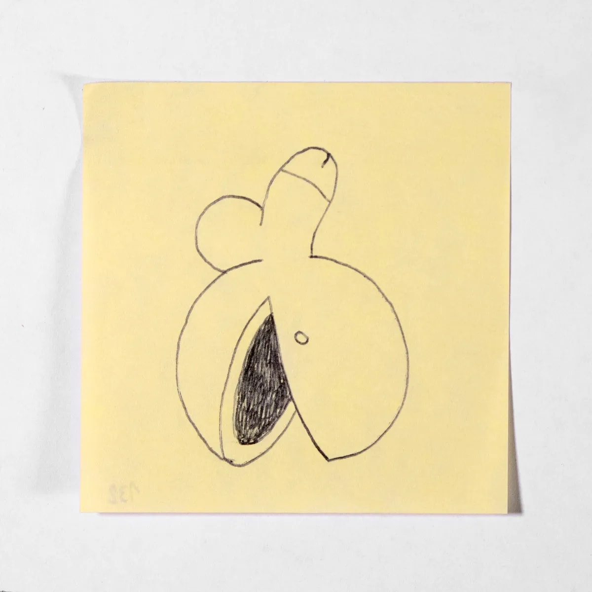 Pacman, No. 132 of 512: a hand-drawn cazzo on a sticky note