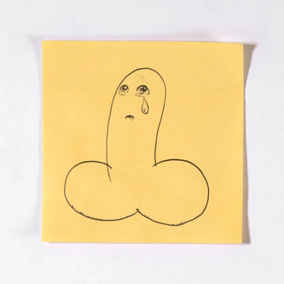 Unhappy, No. 407 of 512: a hand-drawn cazzo on a sticky note