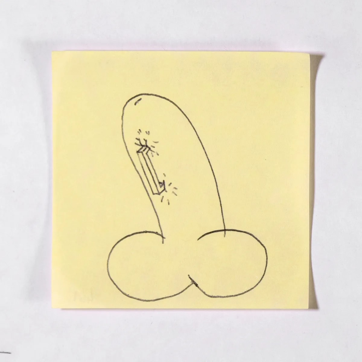 Stapled, No. 461 of 512: a hand-drawn cazzo on a sticky note