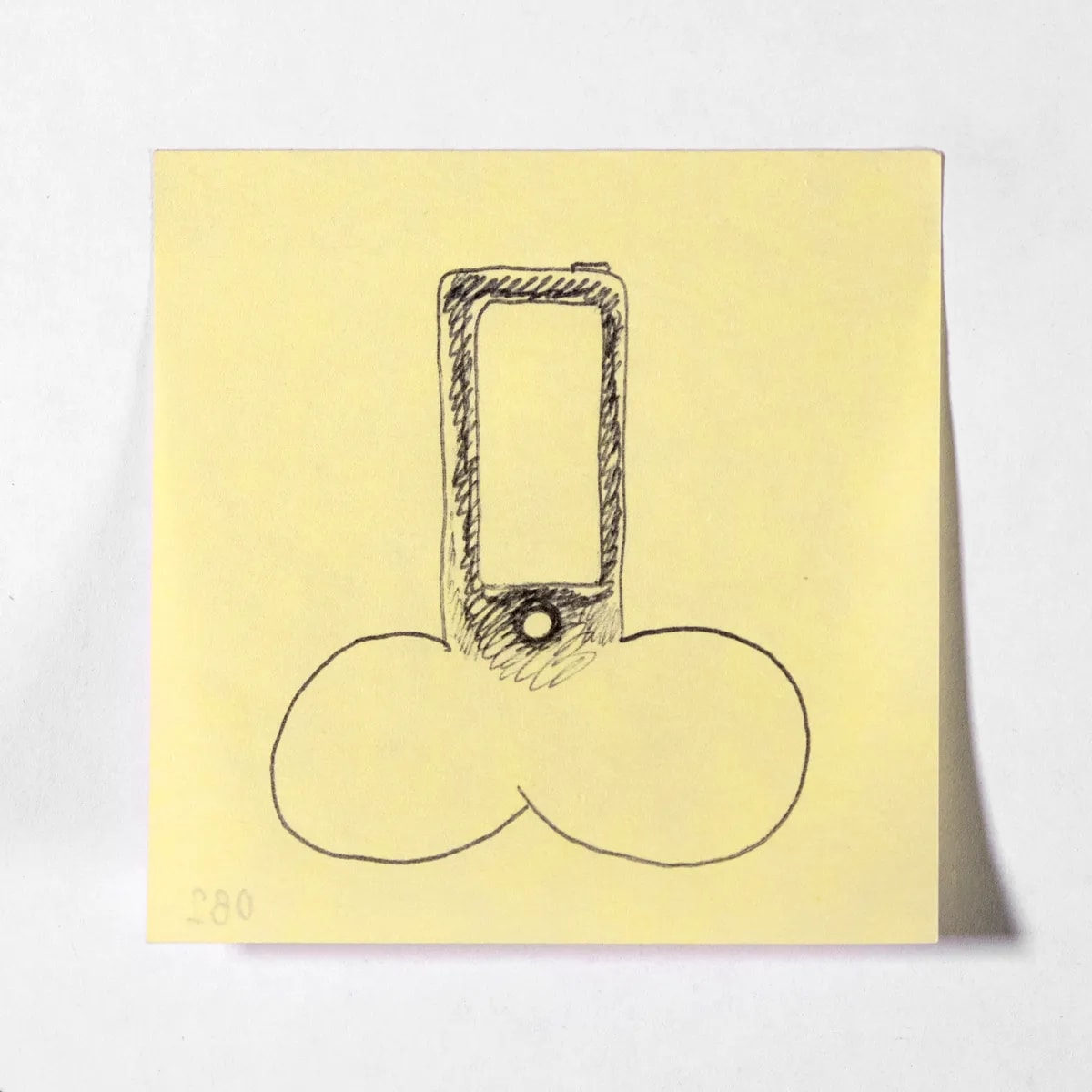 Device, No. 082 of 512: a hand-drawn cazzo on a sticky note