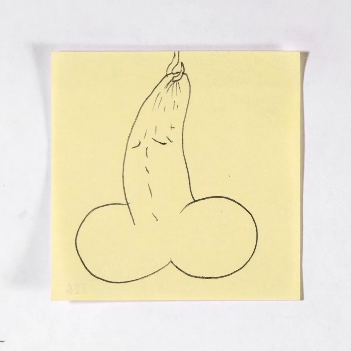 Caught, No. 326 of 512: a hand-drawn cazzo on a sticky note
